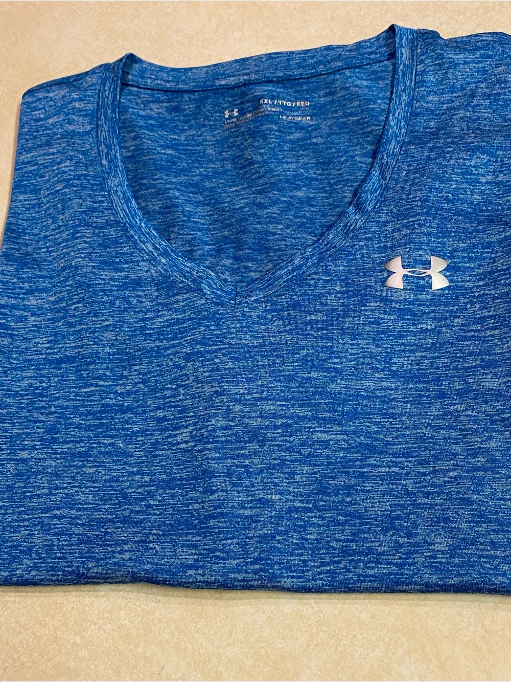 Under Armour women’s Royal Blue Heather V-Neck Performance Tee
